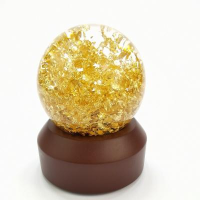 China Imperial Crystal Ball Wholesale Classic China 6.5Cm Diameter Gold Foil Crystal Balls for sale