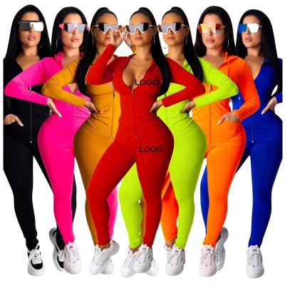 China 2021 Sustainable Two Piece Drop Fitness Sets Women Crop Top And Side Zipper Pants Outfits Matching Long Sleeve Workout Set for sale