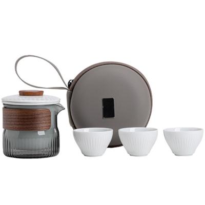 China Presentation Gift Set Dongli Travel Express Cup Set Portable Round Bag One Pot Three Cup Business Tea Set Gift for sale