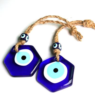 China FASHIONABLE Home Ministry Wall Decoration Pendant Turkish Blue Eyes Hexagonal Devil Eyes Charms Glass Pendant Jewelry for sale