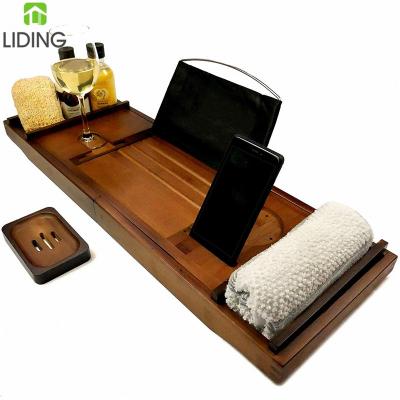 China Sustainable Warm Bamboo Tub Tray Bath Organizer Bathtub Brown and Bed Tray with Extending Sides for sale