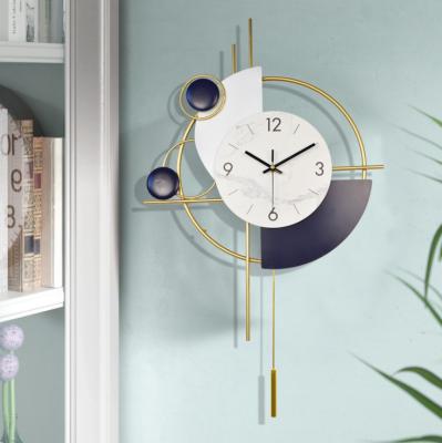 China Nordic creative fashion household clock trend living room wall clock modern swing style wall watch modern contracted watch for sale