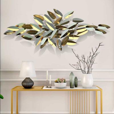 China Eco-friendly Classic Leaf Modeling Titanium Arts And Crafts Living Room Sofa Background Wall Pendant Wall Decorations for sale