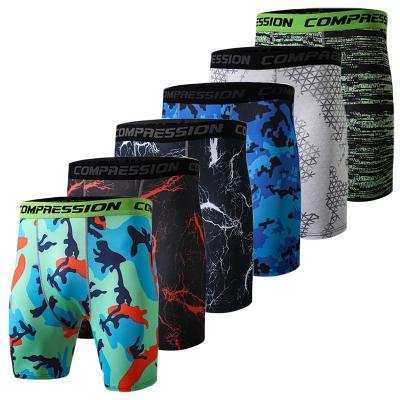 China Quick Dry Compression Tights Breathable Running Tights Pants Fitness Camouflage Running Tight Shorts for sale