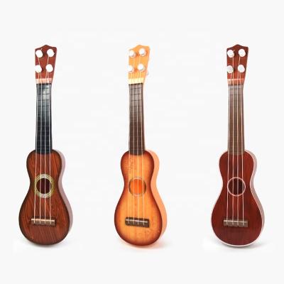 China Nylon Strings Learning Educational Plastic ABS Musical Instrument Squash Guitar Toys For Children Kid for sale