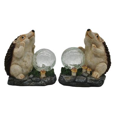 China Europe Outdoor Figurines For Patio Yard Lawn Porch Ornament Gift Garden Decoration Resin Hedgehog Solar Statues for sale