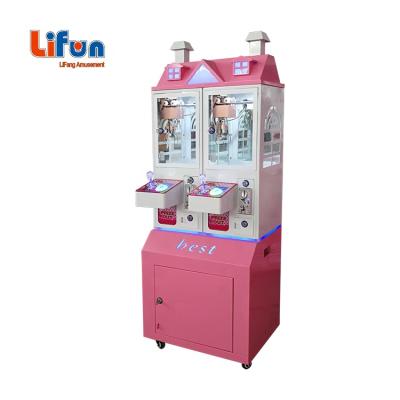 China Cheap Small Stacker Arcade 2 Player Chocolate Candy Toy Prize Crane Game Mini Claw Machine For Singapore W50*D64*H162m for sale