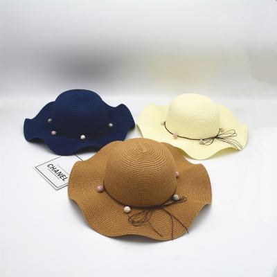 China Hot Selling Beach Women Summer Sun Hat Broad Brim Pearl Straw Hats Beach Straw Hat for sale