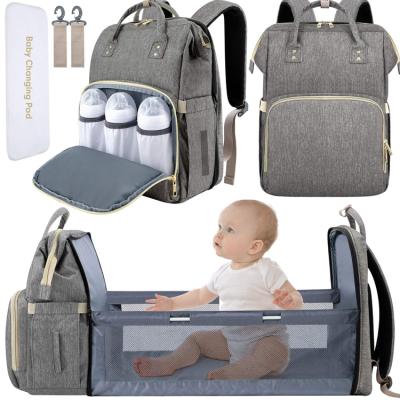 China With USB Travel Backpack Baby Cot Mom Diaper Waterproof Diaper Bag With Bed for sale