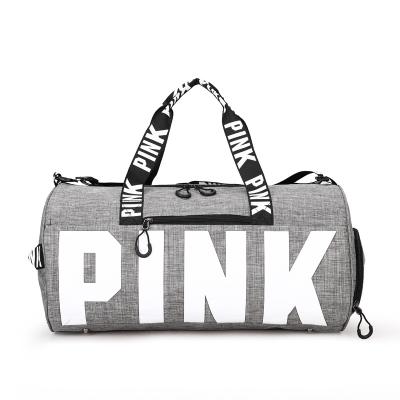 China Large Capacity Sports Fitness Travel Duffel Bag Pink Waterproof Duffel Bag Women Sports Bags for sale