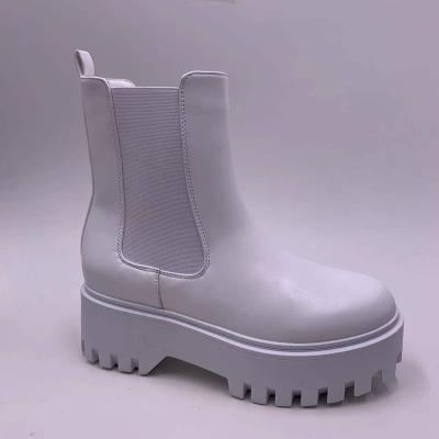 China 2022 new light weight leather martens winter thick bottom booties with elastic band women's boots color white ladies boots for sale