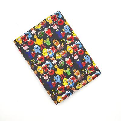 China Cartoon Sesame Street Printing Organic Cotton Digital Printing Fabric Maker Printer Custom Print Cotton Woven Fabric for sale