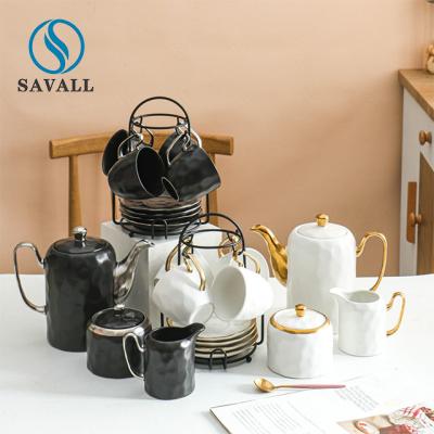 Cina Piattino irregolare della tazza della prima colazione di Rim Porcelain Cups And Saucers Savall dell'oro in vendita