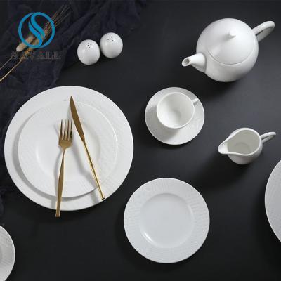 China Savall grabó en relieve el servicio de mesa blanco de la porcelana fija para las bodas del restaurante en venta