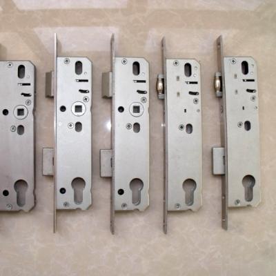 China Door DIN Standard 85/92mm Aluminum Narrow Roller Mortise Sash Lock With SS304 20/25/30/35mm Roller Fire Lock Rated Body Aluminum Door Frame for sale