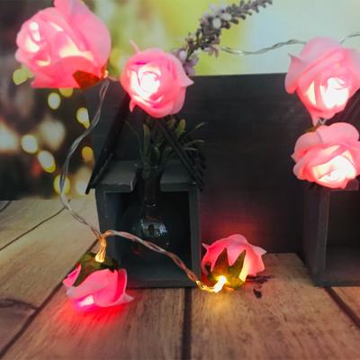 China Holiday Light Valentine's Day Decoration Warm Rose Rose With Leaves Wedding Decoration Lights String for sale