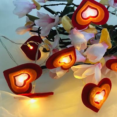 China Holiday Decoration Light Weight Nonwoven Fabric Double Rose Heart Shape Led Curtain String Lights for sale