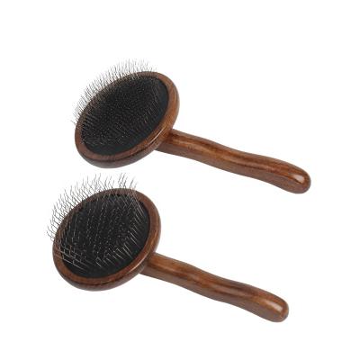 China Custom Stocked Logo Dark Wooden Long Needle Mold Slicker Brush Pet Grooming Brush for sale