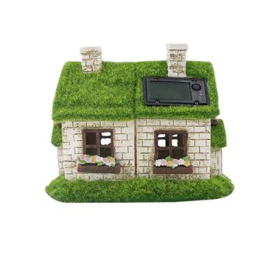 China Miniature Europe Solar Lights Resin Flocking Village House For Garden Decor for sale