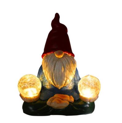 China Europe Solar LED Lights Christmas Resin Gnome Figure Decoration Gnomes Statue Garden Ornament for sale