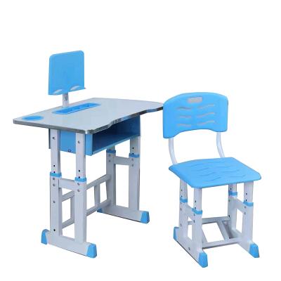 China 2021 new height adjustable Chinese factory children study table and chair set for boys and girls for sale