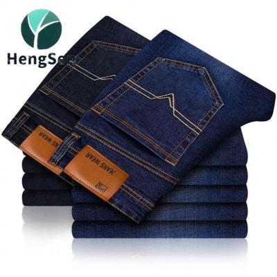 China Plus size ripped badge and print detail men jeans loose skinny fit men pants for customized. for sale