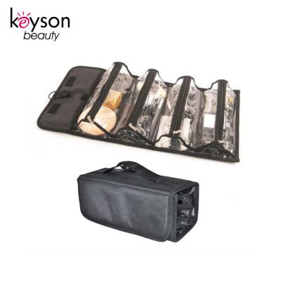 China Keyson Clear Folding Hanging Makeup Organizer Bag With 4 Interior Triangular Pocket for sale