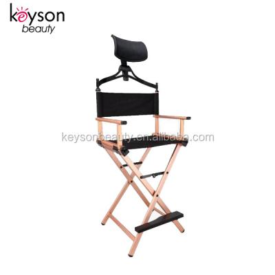 China Lightweight And Foldable Keyson Customized Aluminum High Make Up Artist Chair Barber Chair With Headrest for sale