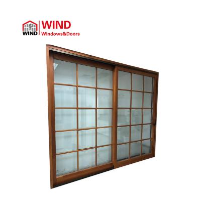 China Interior Design Modern Decorative Glass Grille Aluminum Clad Wood Lift And Slide Door for sale