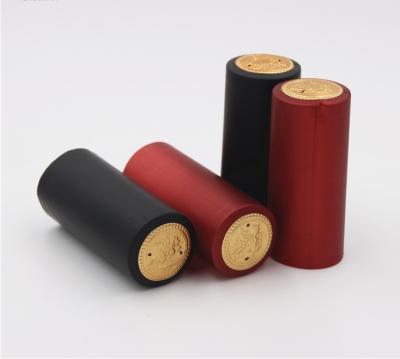 China Heat Shrink Capsule Sealing Bath Shower Cap Red Pvc Heat Shrink Cap For Wine Bottle for sale