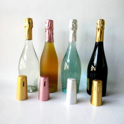 China Tapón de papel de aluminio en relieve para botella de champán personalizado de color dorado cápsula de papel de vino cápsula de papel de champán en venta