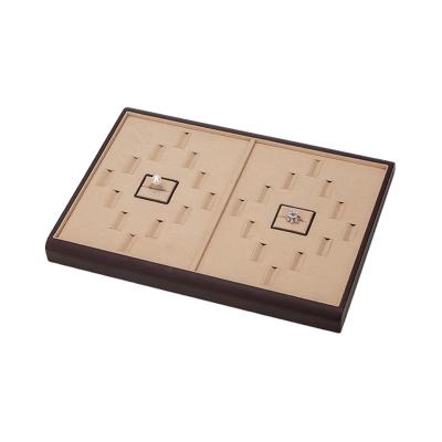 China Trendy Stone 2022 Gem Jewelry Display Stand Custom Luxury Leather Handmade Diamond Ring Display Tray for sale