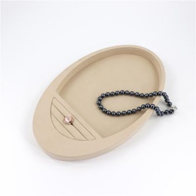 China Fashionable Minimalism Stylish Custom Luxury Oval Jewelry Display Tray with Logo for Ring Earrings Necklace for sale