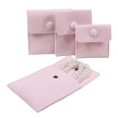 China Fashionable Luxury Microfiber Velvet Travel Jewelry Packaging Pouches With Logo Button for sale