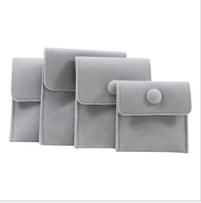 China Travel Fashionable Wholesale Microfiber Jewelry Drawstring Jewelry Packaging Pouches With Logo Button for sale