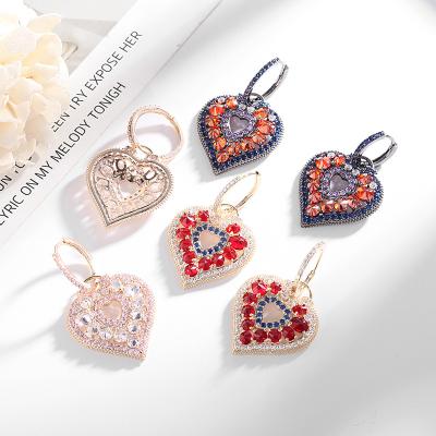 China Hot Style Environmentally Friendly Blues RTS Colorful Micro Paved Cubic Zirconia Peach Heart Stud Earrings For Women Fashion Jewelry for sale