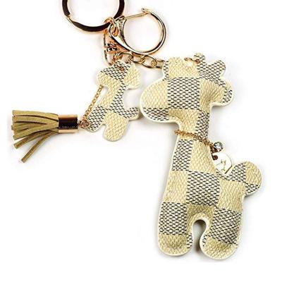 China Unique Fashion Fashion Design Customized Key Chain Leather Animal Pig Head Chain With Tassel for sale