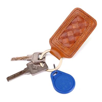 China Fashion factory direct sale real color brown cowhide braided leather key chain for sale