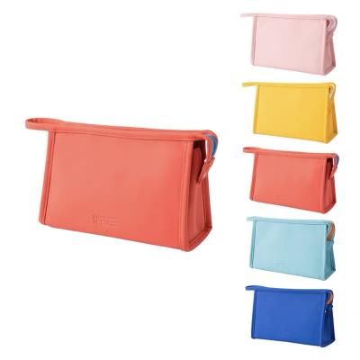 China Fashion Cheap Price Ladies PU Frosting Storage Packaging Solid Color Custom Zipper Cosmetic Makeup Travel Stand Up Waterproof Bag for sale