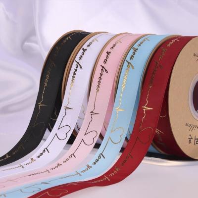 China Luster Packing Decoration Custom Logo wholesale luxury white gold foil polyester color petersham grosgrain ribbon personalized for sale