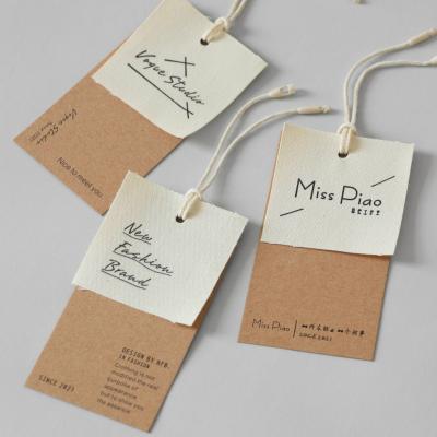 China Viable Free Design Printing Name Logo Brand Cotton Labels Canvas Fabric Custom Wrapping Paper Thick Label Paper Design For Clothes for sale