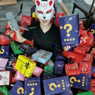 China Gift & lucky & 2022 surprise mystery lucky box including items 3-5 items 100% mystery box surprise winning gift can receive cameras, drones, mobile phones for sale