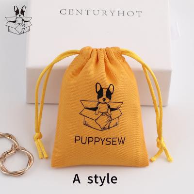 China Morden Yellow Canvas Jewelry Pouch, Small Gift Packaging Bags Jewelry Package Drawstring Bag With Custom Logo for sale