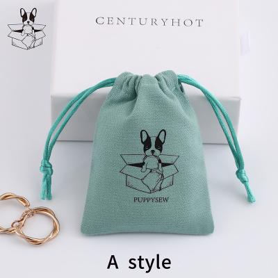 China Wholesale Morden Canvas Cotton Jewelry Bags, Drawstring Packaging Bags, Jewelry Pouch with Custom Logo for sale