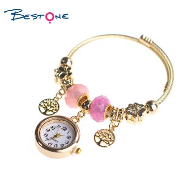 China Bestone Fashion Ladies Stainless Steel Watch Women Wrist Watch Gold Plated Big Hole Beads Charm Bracelet Bangles for sale