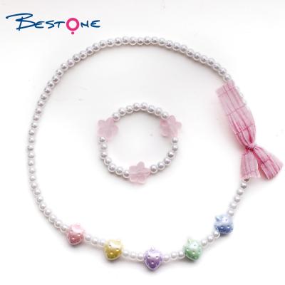 China Bestone TRENDY Candy Kids Customized Round Bead Fabric Bowknot Necklaces Bracelet White Plastic Kids Cartoon Jewelry Jewelry for sale