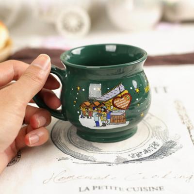 China Esmalte único personalizado gres de la historieta del tarro de café de las tazas del pote verde de cerámica de la porcelana en venta