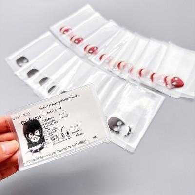 China Customized Eco-Friendly LOGO Side-Open Waterproof Business Card Protector Sleeves Soft PVC Funny Business ID Card Holder For Driver's License for sale