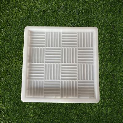 China Non Losing Shape Paving Garden Concrete Stone Restrictor Path Silicon Mold Plastic Paver Mold For Interlock Paver for sale