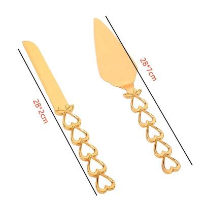 China New 2023 Viable Love Handle Model 2pcs Set Bread Knife And Gold Shovel Cake Serving Tool Kit For Party Use for sale